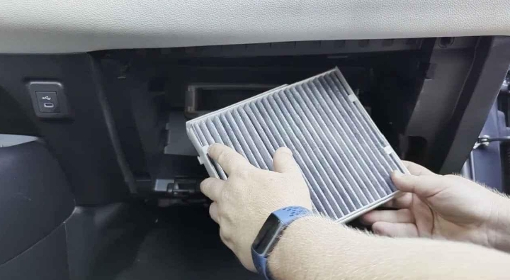 Cabin air filter with activated carbon