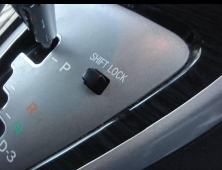 Shift lock button